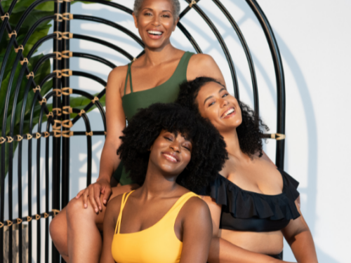 Three Black women modeling bathing suits