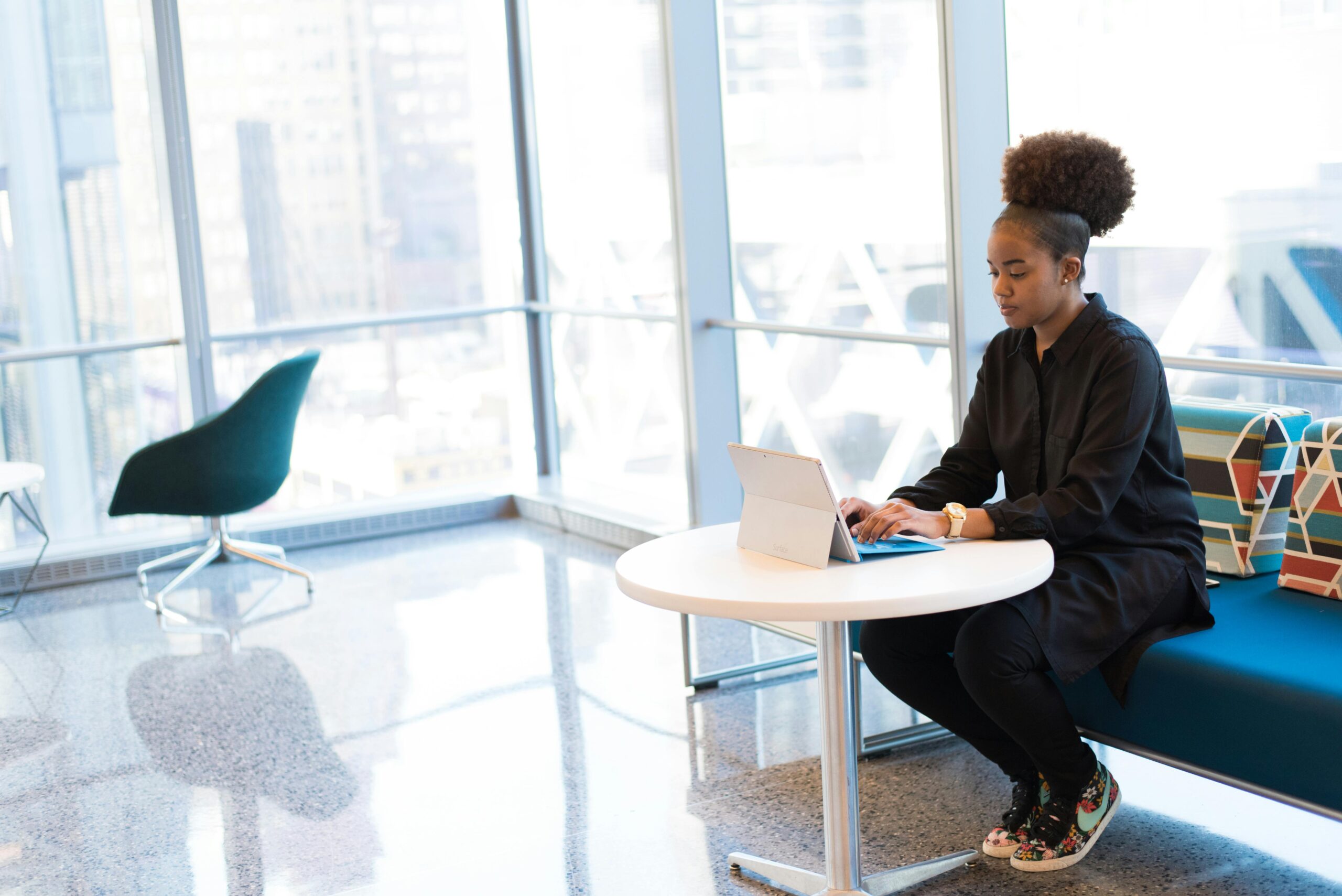 woman typing in laptop